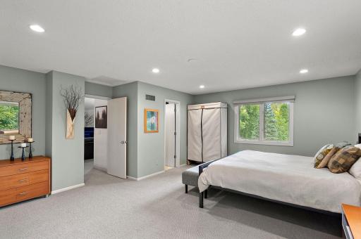 Primary bedroom with full marble, tile bath