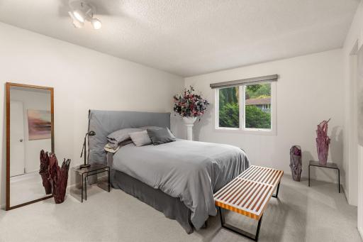 Main Floor bedroom 2 with walk-thru bath
