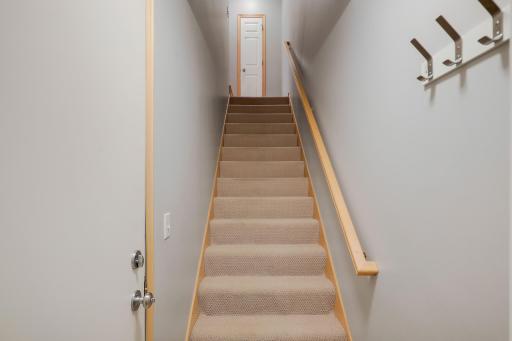 View of the stairs leading from the garage.