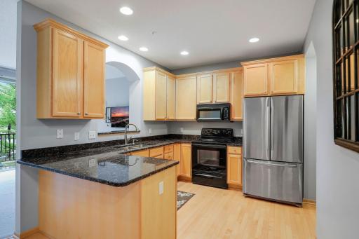 There is an abundance of cabinetry, granite counter tops, under mount sink all with a functional layout.