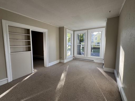 Unit 1 built in shelves living rm