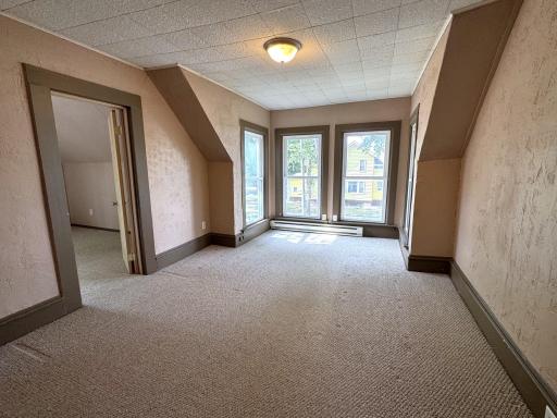 Unit 2 living room with big windows