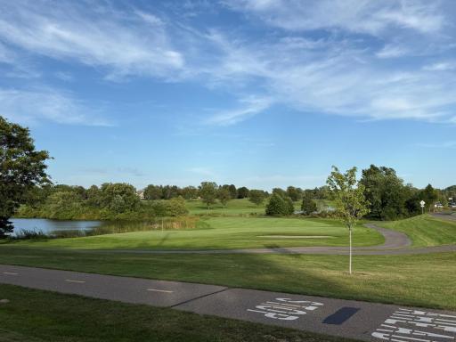 Browns Creek bike path with distant views of Oak Glen Golf Course and Country Club.
