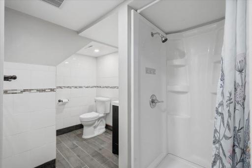 Lower level 3/4 bath LVP flooring.