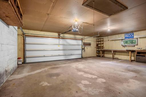 Oversized garage offers 2 car garage door with space for 3 cars.
