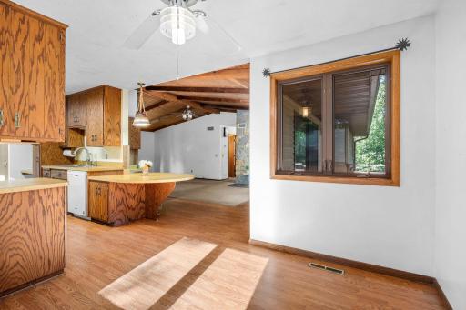 Informal dining and large kitchen breakfast bar. Abundance of windows throughout bring in a ton of natural light.