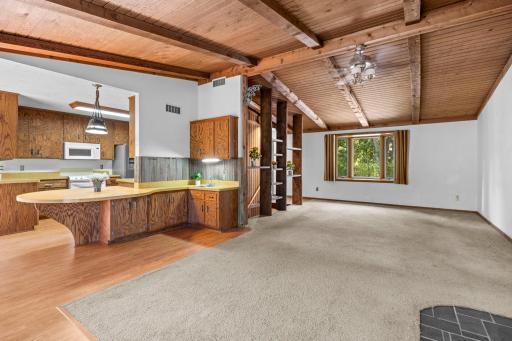 Spacious main level living with beautiful, wood vaulted ceilings.