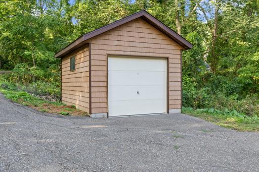 Storage Shed or potential extra garage space for small car.