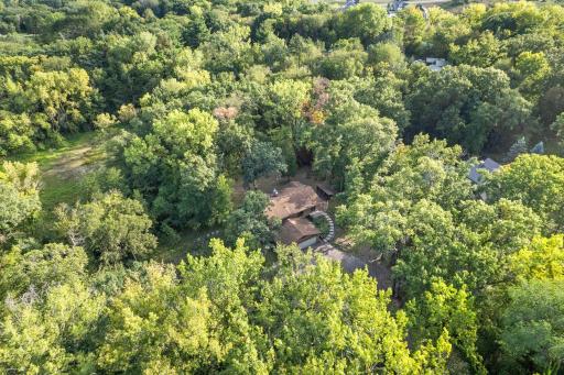 Fantastic location, neslted in the trees in a private, acreage neighborhood of Concord Acres.