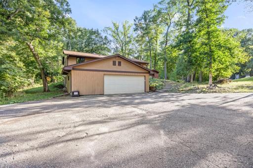 Private setting! 3 car garage plus a ton of extra, outdoor parking!