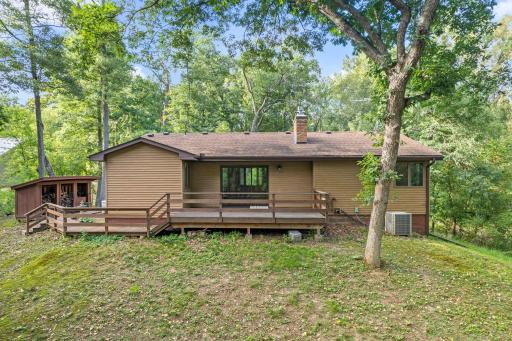 Enjoy the outdoor space and mature trees on this large, wrap around deck.