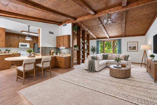 The wood vaulted ceilings are beautiful! (Virtually staged for you to envision and highlight this incredible living room space with wood vaulted ceiling and open floor plan.)