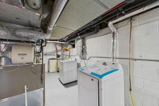 New washer and dryer in lower level laundry.