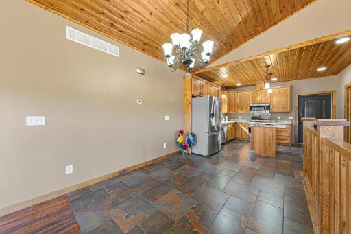 The dining area is situated near the open concept kitchen.