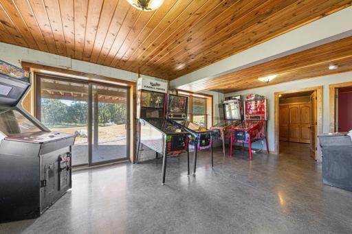 The spacious family room features a sliding patio door that leads outside.