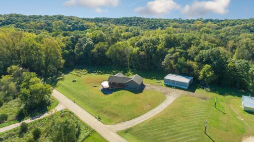 Nestled in a beautiful area surrounded by mature trees only 10 minutes from Mankato.
