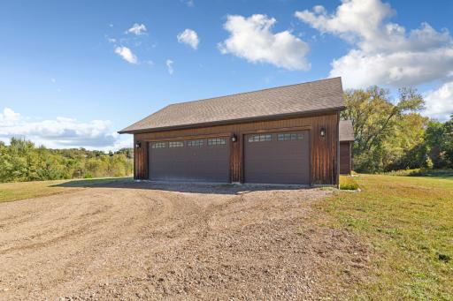 The attached 3 stall garage features in-floor heat.