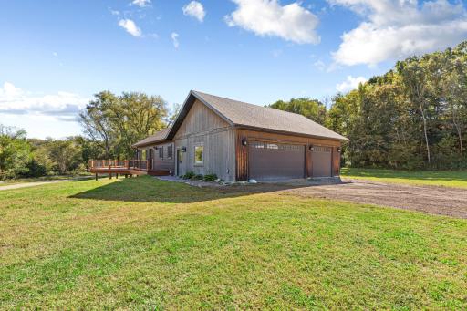 The attached 3 stall garage features in-floor heat.