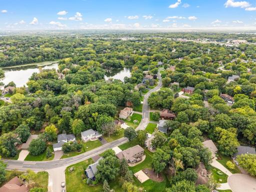 Mature trees, hilly winding roads, generous lots, and individually styled homes give this area a charm that is getting harder to find, while keeping you close to parks, Crystal Lake Golf Club, and easy access to local schools and I-35.