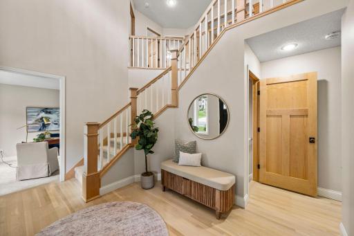 The two-story entry immediately makes an impression, bringing in tons of natural light and opening to a welcoming floor plan with a walk-in entry closet and plenty of room to settle in.