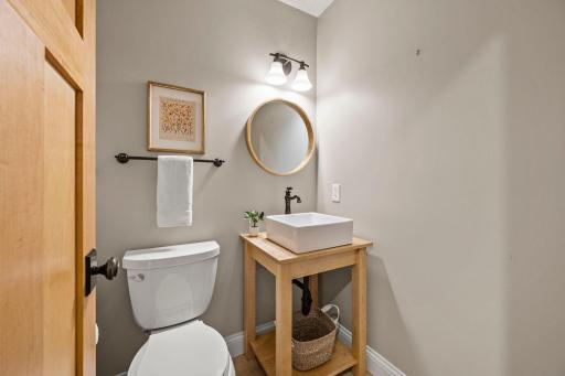 Thoughtful updates continue throughout, including refinished wood floors (2021) and updated millwork (2018). Convenient main-level half bath!