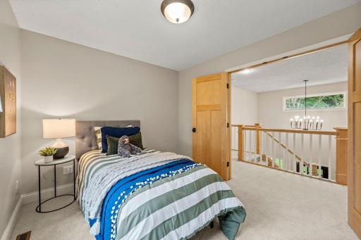 The third has French doors, natural light, and comfortable carpeting.