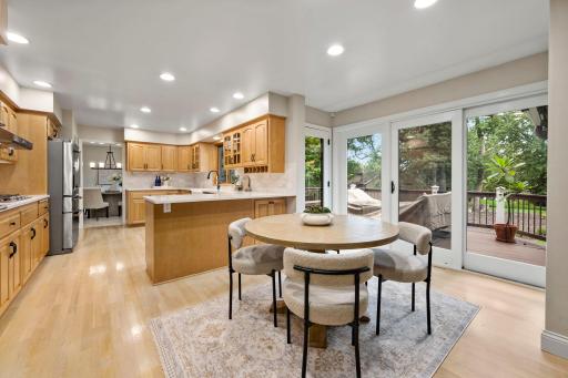 The informal dining area opens directly to the deck.