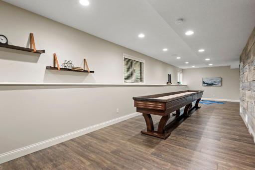 The adjoining rec room adds even more room for movie nights, game days, hobbies, or spreading out.
