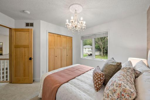Two of the bedrooms feature closets with built-in organization.