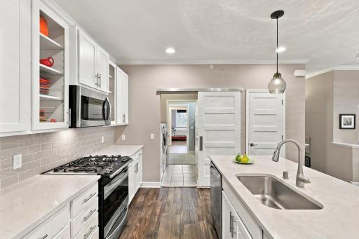 Sliding door access opens to laundry area