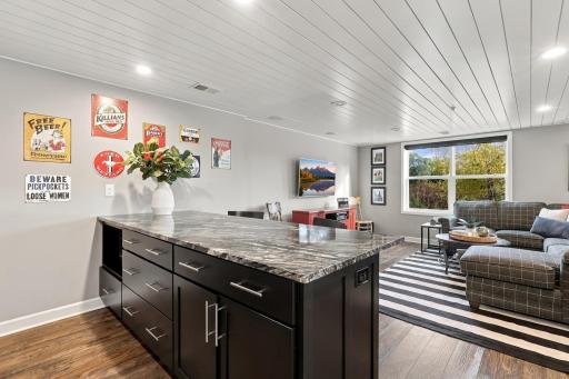 7 foot island provides expansive storage & counter height seating.