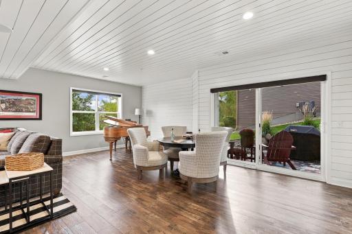 Stunning, spacious design with sliding doors to covered patio & expansive back yard with pond