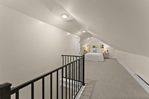 Upper level private king suite, fit multiple beds for the kids or use as private primary!