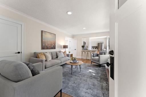 Spacious living room overlooking kitchen and dining