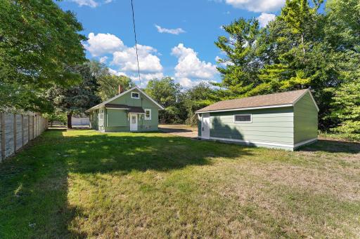 Nice sized concrete driveway plus 2 car garage with remote openers