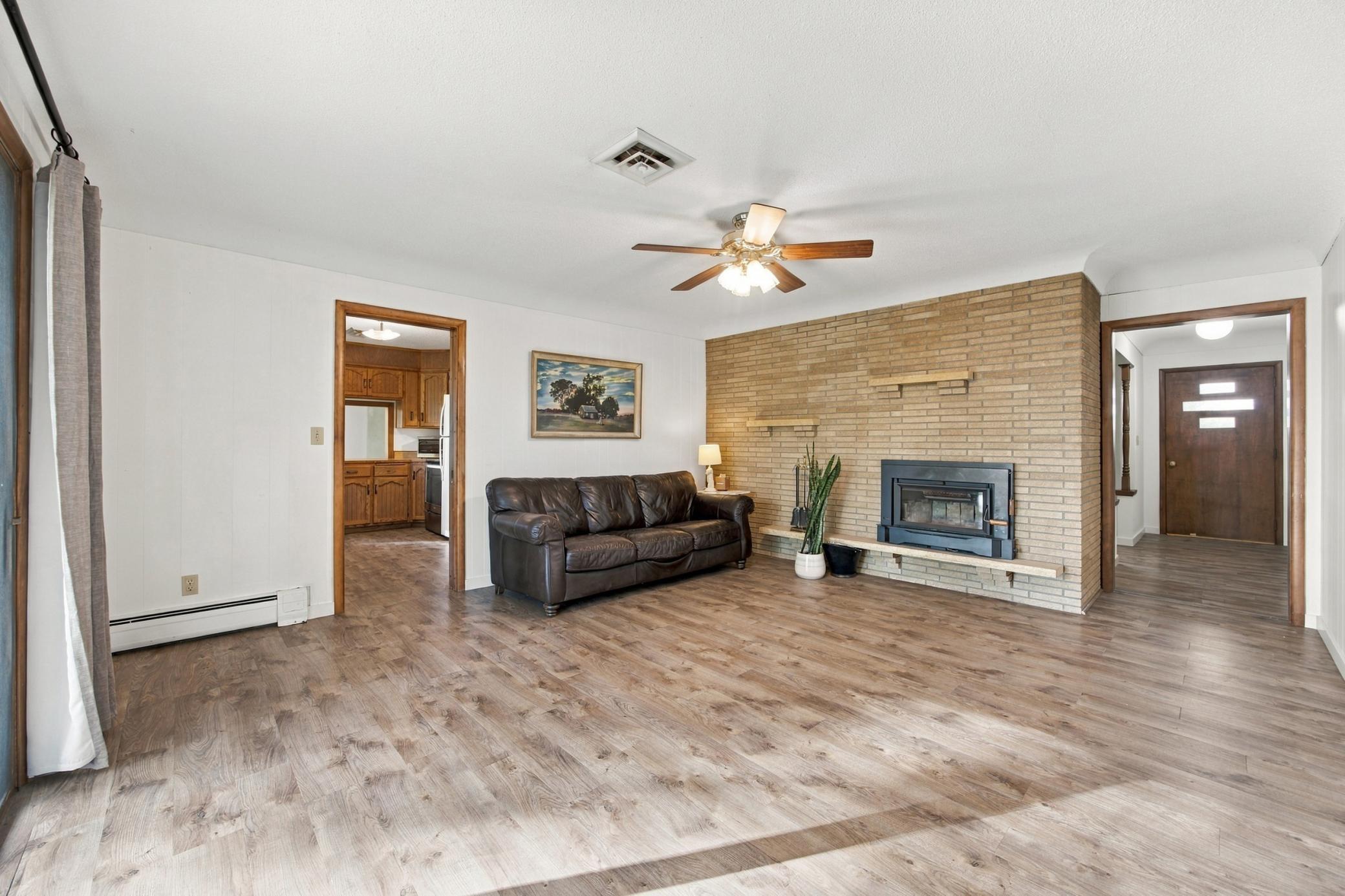 Den - with new wood burning fireplace