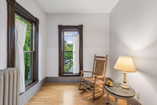 Sitting room within the primary bedroom.