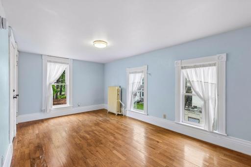 The second bedroom on the main level has a large closet, and addition access through the back stairwell.