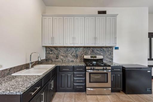 Alternate view of the kitchen.