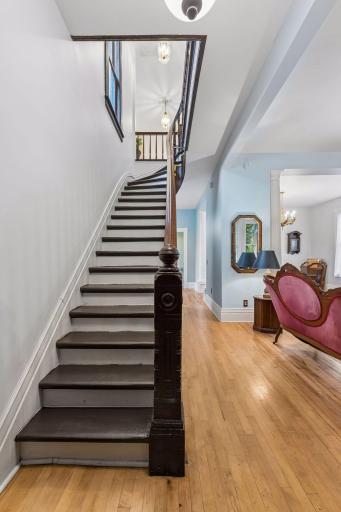 Upstairs are additional flex spaces, two bedrooms, and a full bathroom.