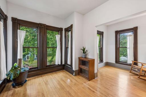 The Saint Paul skyline can be seen from the bay windows in the primary bedroom.