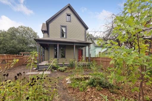 The backyard is fully fenced in with a wood privacy fence.