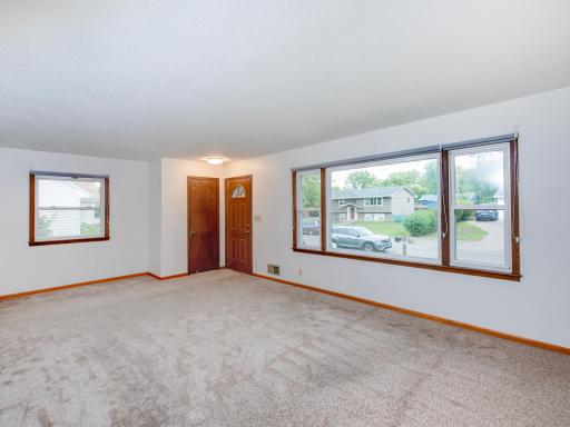 Light-filled front living room with an open, welcoming layout.