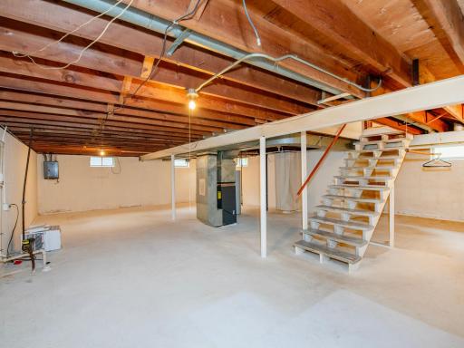 Unfinished lower level with plenty of room to create additional living space.