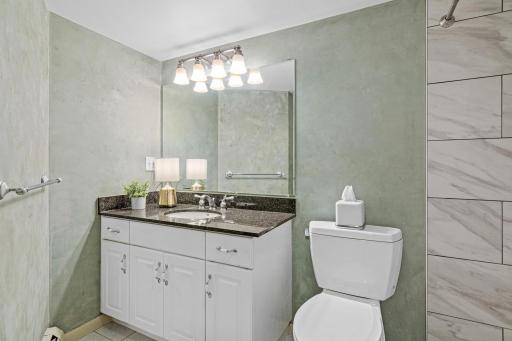 Spacious and beautifully updated full bathroom in the lower level.