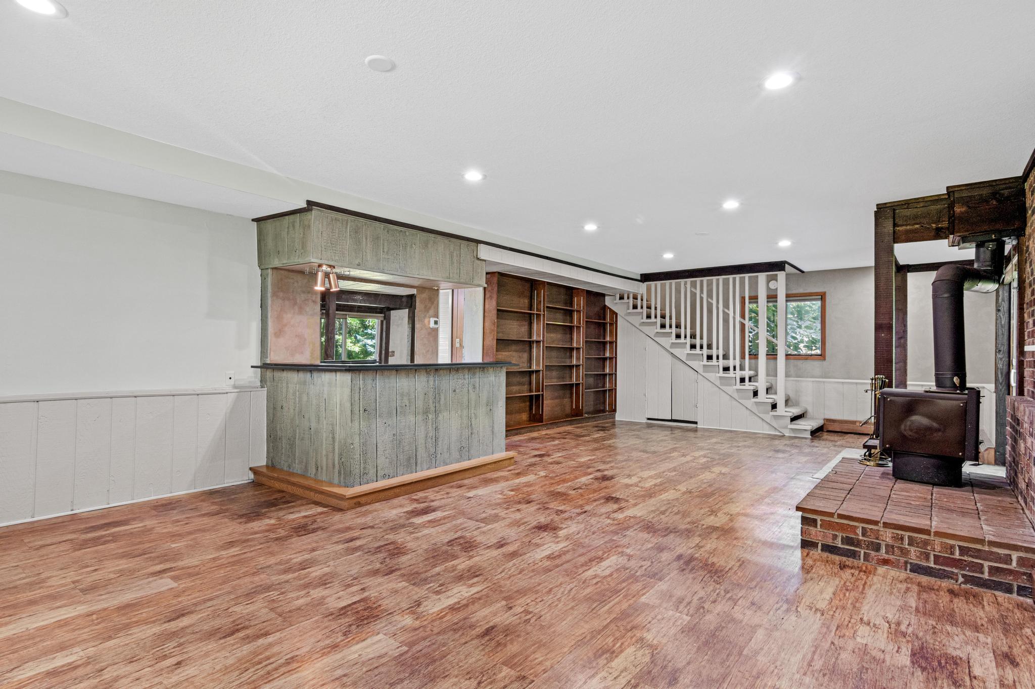 Perfectly positioned for entertaining, the lower-level wet bar makes hosting friends and family effortless. A great spot for mixing drinks, serving snacks or enjoying casual gatherings.