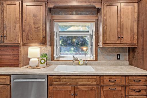 Beautiful cabinetry and plenty of storage in the thoughtfully designed kitchen.