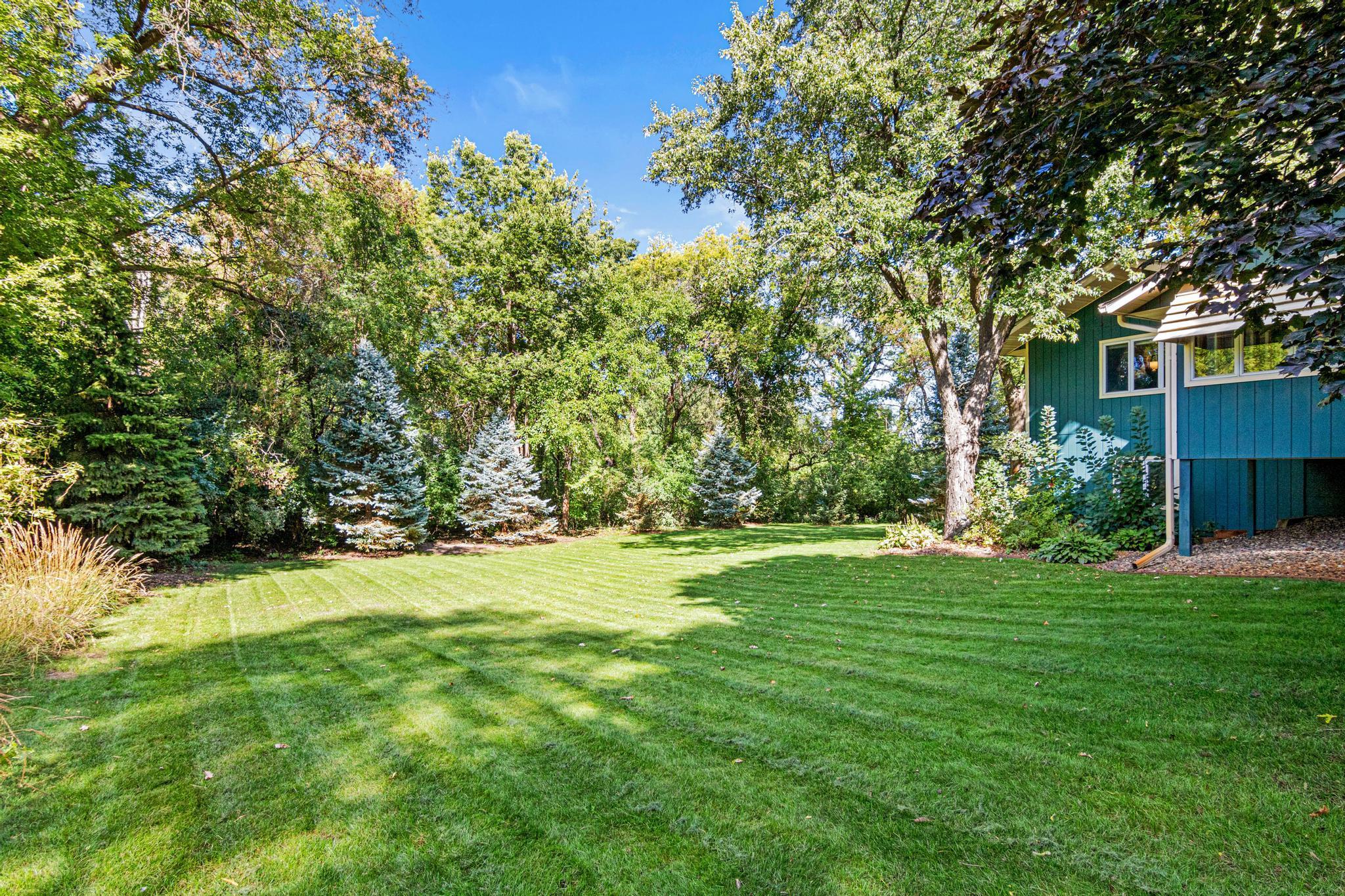 Large yard with plenty of room for fun. Kick the soccer ball or play catch!