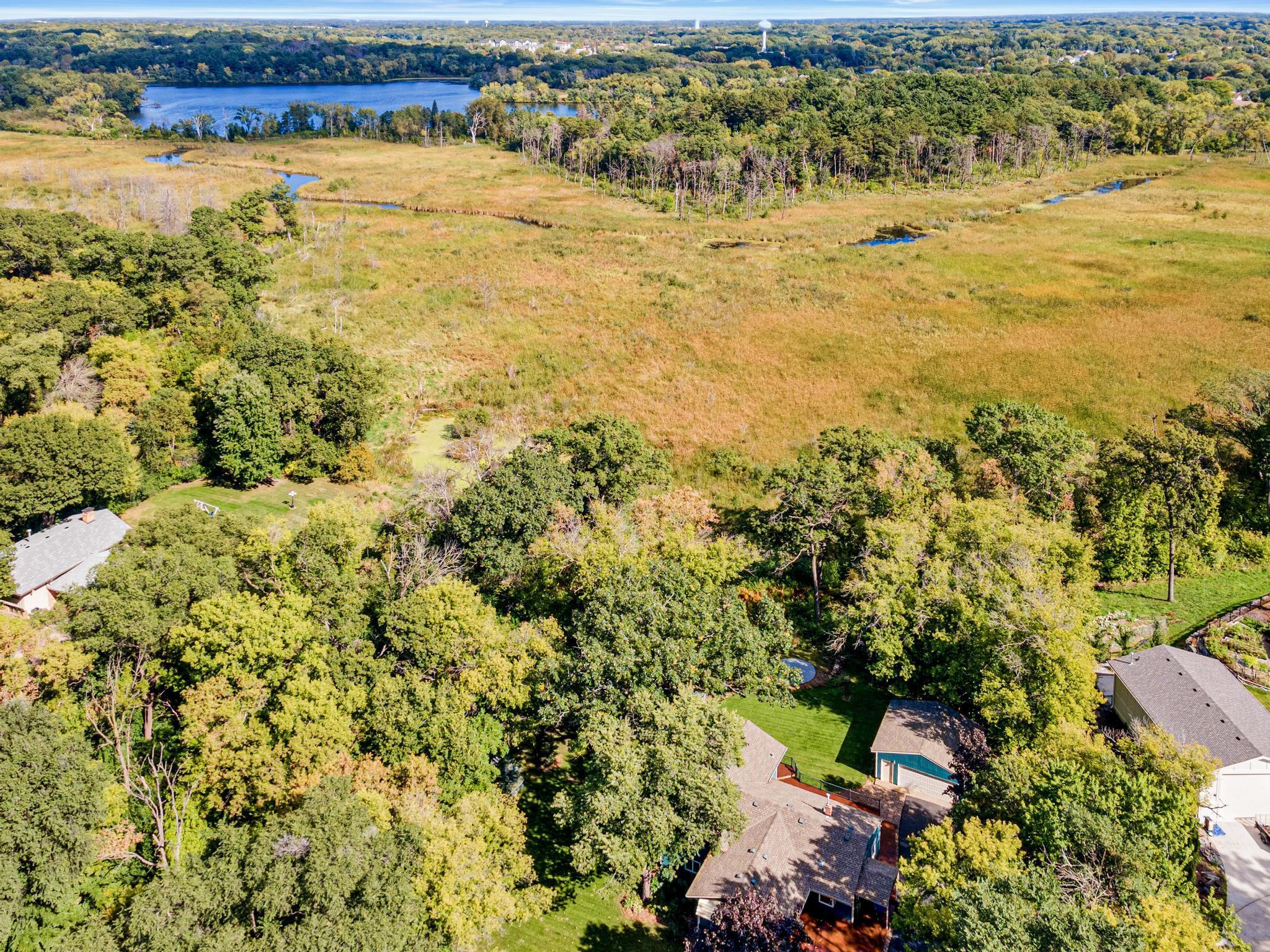 Rare .8-acre setting in the heart of Vadnais Heights, surrounded by the natural beauty of Sucker Lake Regional Park.