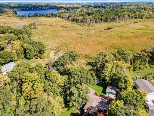 Rare .8-acre setting in the heart of Vadnais Heights, surrounded by the natural beauty of Sucker Lake Regional Park.